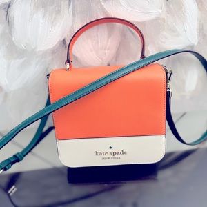 Kate Spade Square Melon Ball purse with forest green accents.